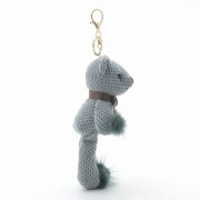 Брелок на сумку Мишка с помпонами зеленый