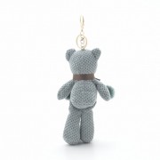 Брелок на сумку Мишка с помпонами зеленый