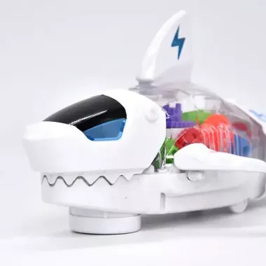 Музична іграшка акула (їздить, шестерні, рухомі частини, звук, світло) S-2А Музична іграшка акула (їздить, шестерні, рухомі частини, звук, світло) S-2А