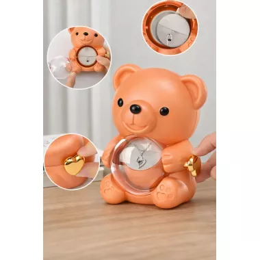 Скринька-ведмідь, що обертається, з трояндою в колбі