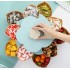 Вращающаяся складная двухъярусная конфетница SUNROZ Flower Candy Box для конфет и фруктов